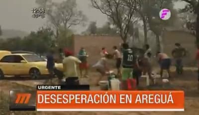Vecinos intentan apagar incendio en Areguá